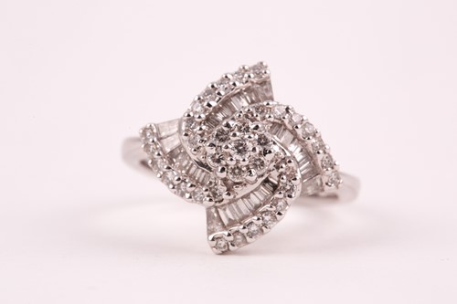 Lot 391 - An 18ct white gold and diamond cluster ring,...