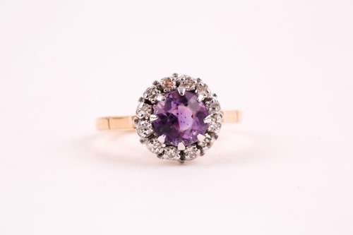 Lot 419 - An 18ct yellow gold, diamond, and amethyst...