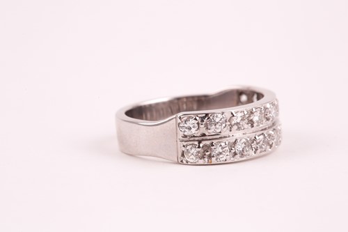 Lot 60 - A double band half eternity diamond ring, set...