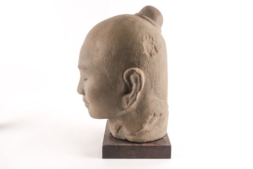 Lot 116 - A composition stone bust of Buddha, 20th...