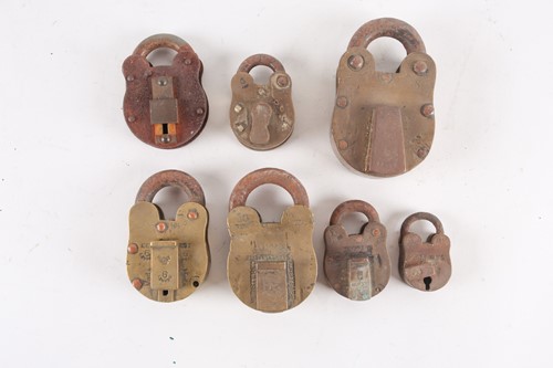Lot 400 - Six brass cased padlocks, early 20th century,...
