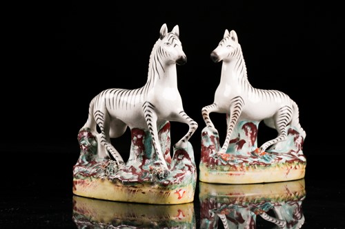 Lot 435 - A pair of late 19th century Staffordshire...