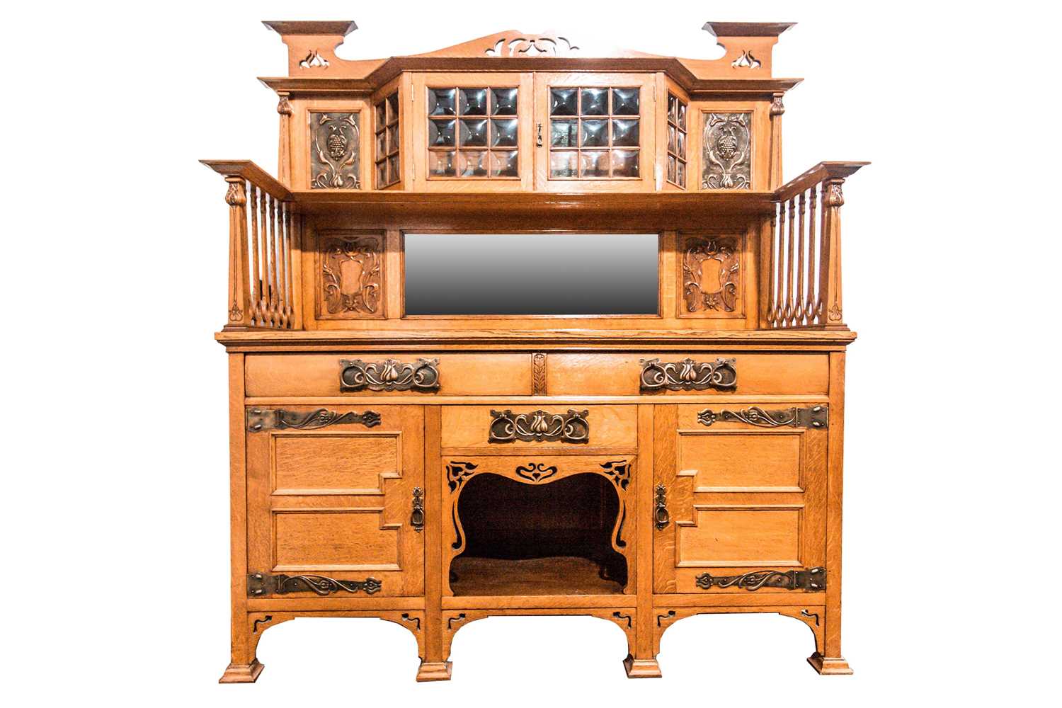 Lot 291 - An early 20th century golden oak arts and...