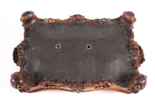 Lot 292 - A Victorian, carved walnut footstool of...