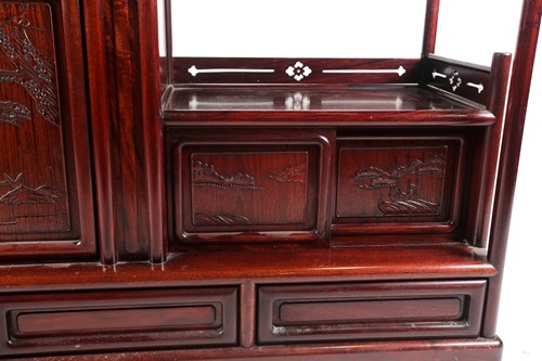 Lot 233 - A contemporary Chinese hardwood display unit,...