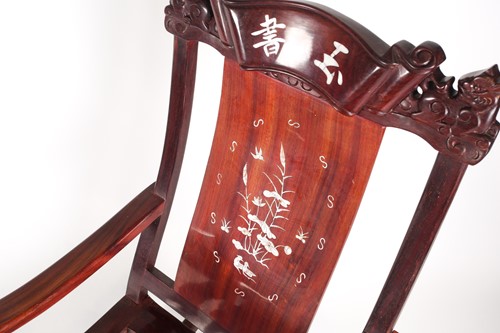 Lot 250 - A contemporary Chinese hardwood rocking chair,...