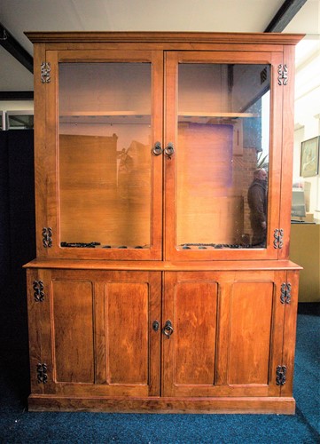 Lot 294 - A craftsman made golden oak glazed gun cabinet....