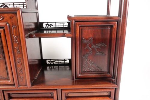 Lot 246 - A contemporary Chinese hardwood display unit,...