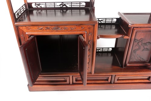 Lot 246 - A contemporary Chinese hardwood display unit,...