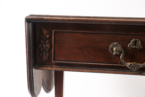 Lot 295 - A George III style, mahogany two flap sofa...