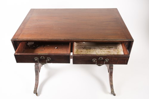 Lot 295 - A George III style, mahogany two flap sofa...
