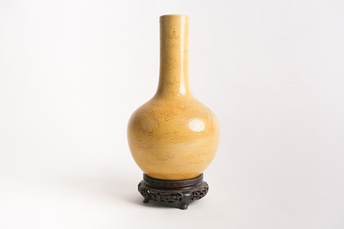 Lot 144 - A Chinese monochrome dragon vase, 19th century,...
