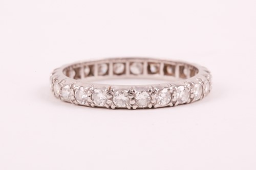 Lot 14 - A diamond eternity ring; the mixed round...