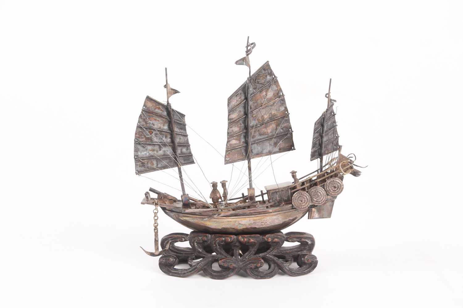 Lot 422 - A Chinese silver study of a junk, circa 1900,...