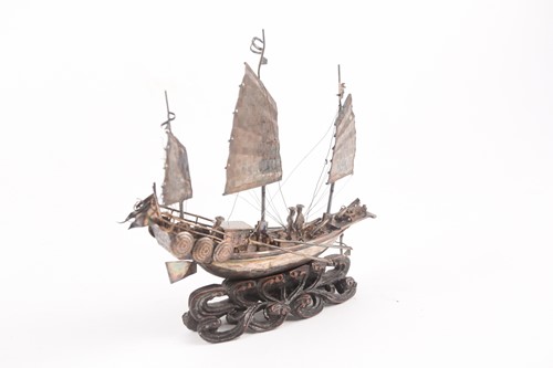 Lot 422 - A Chinese silver study of a junk, circa 1900,...
