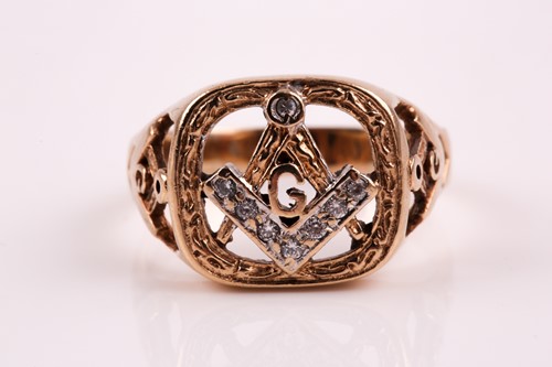 Lot 52 - A 9ct gold and diamond Masonic ring, the large...