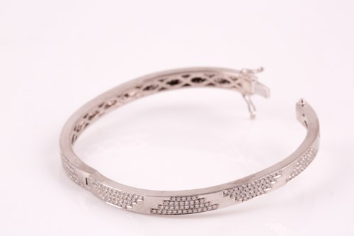 Lot 197 - An 18ct white gold and diamond bracelet; the...