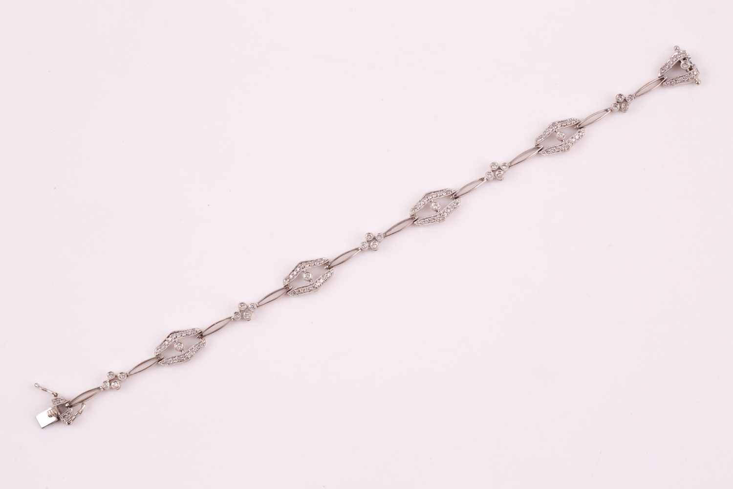 Lot 37 - A diamond bracelet; of alternating diamond set...