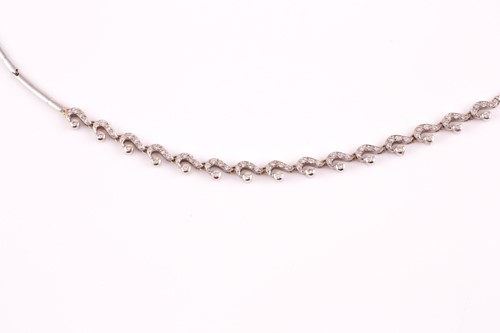 Lot 337 - A18ct white gold and diamond necklace, the...