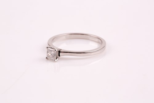 Lot 281 - A single stone diamond ring, the princess cut...