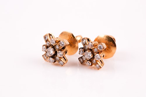 Lot 144 - A pair of diamond cluster earrings, the...