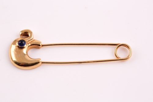 Lot 190 - A safety pin brooch, the terminal set with an...