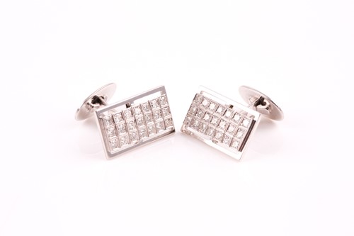 Lot 54 - A pair of diamond cluster cufflinks, the...