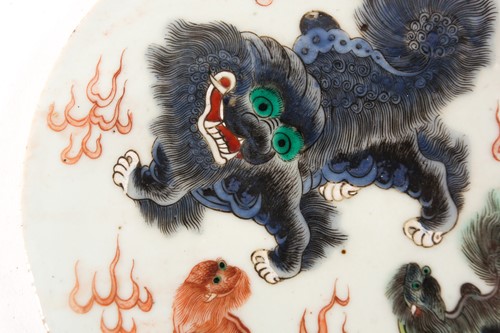 Lot 165 - A Chinese porcelain circular plaque, Qing,...
