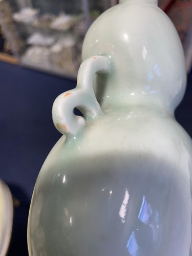 Lot 166 - A Chinese celadon gourd vase, Qing, 18th/19th...