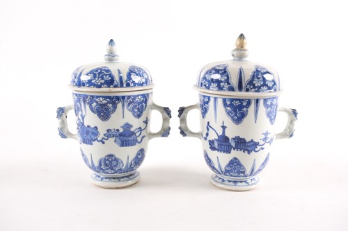Lot 168 - A pair of Chinese porcelain two handled cups...