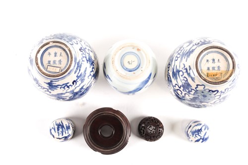Lot 176 - A pair of Chinese blue & white earthenware...
