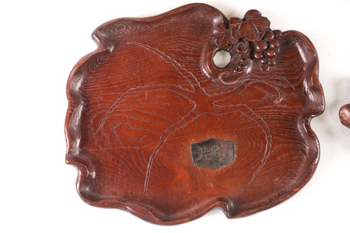 Lot 195 - Two Japanese carved wood trays, late...