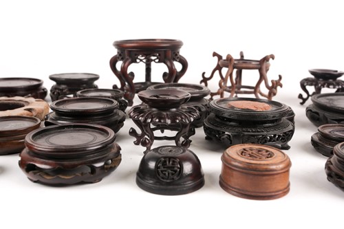 Lot 177 - A collection of twenty three Chinese carved...
