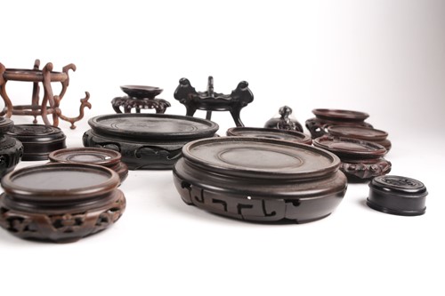 Lot 177 - A collection of twenty three Chinese carved...