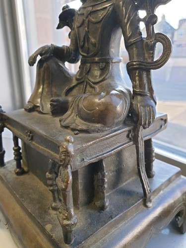 Lot 180 - A Chinese patinated bronze figure of a Tara...