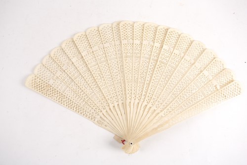 Lot 184 - A Chinese carved ivory fan, 19th century,...