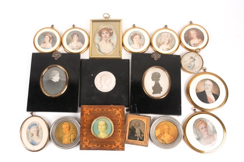 Lot 385 - A group of eleven portrait miniatures on ivory,...