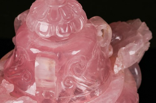 Lot 204 - A Chinese 20th century carved rose quartz...