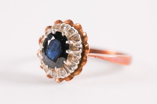 Lot 103 - An 18ct yellow gold, sapphire, and white stone...