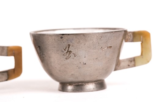 Lot 207 - Four Chinese pewter, jade and Yixing teacups,...