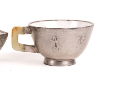 Lot 207 - Four Chinese pewter, jade and Yixing teacups,...