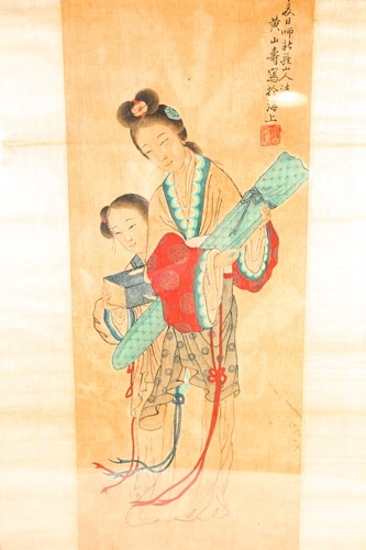 Lot 213 - A Chinese painting on silk of a lady carrying...
