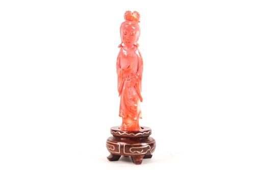 Lot 214 - A Chinese carved coral figure of Guanyin,...