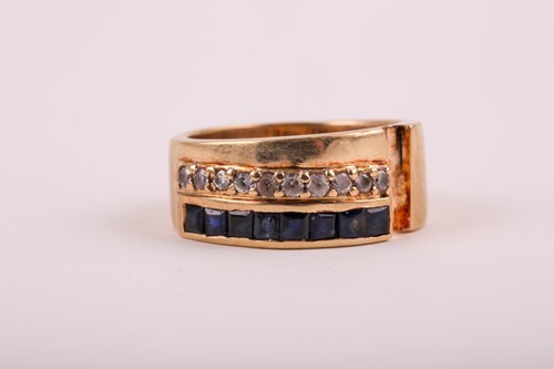 Lot 143 - A yellow metal, sapphire, and white paste...