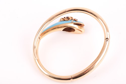 Lot 101 - A yellow metal and turquoise enamel snake...