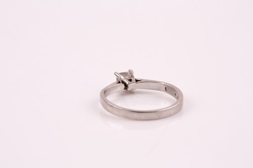 Lot 330 - A single stone diamond ring, the princess cut...