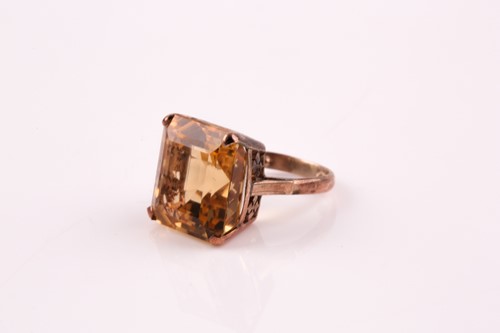 Lot 60 - A single stone citrine ring, the square...