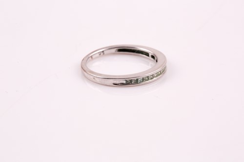 Lot 86 - A half hoop diamond eternity ring, the...