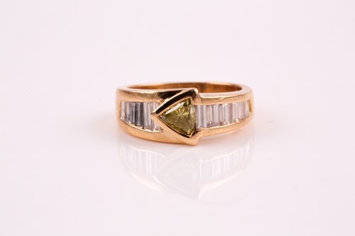 Lot 93 - A fancy yellow diamond and diamond stylized...