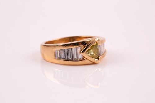 Lot 93 - A fancy yellow diamond and diamond stylized...
